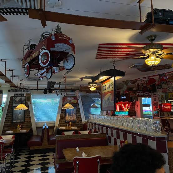 Vintage decor and model train inside City Diner, West Palm Beach