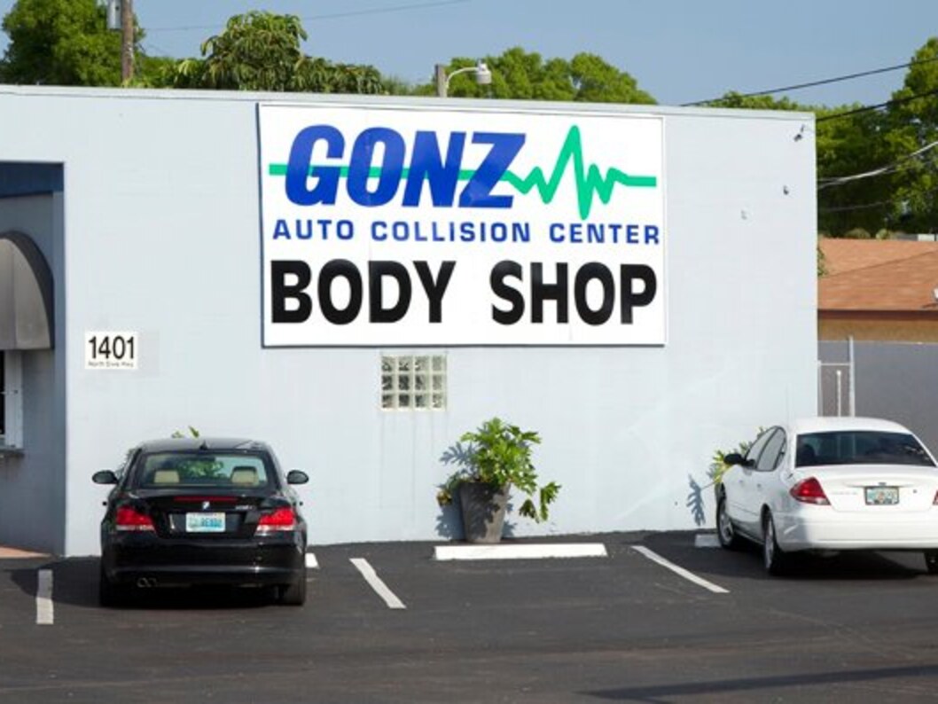 Gonz Auto Collision Center body shop at 1401 N Dixie Hwy in Lake Worth Beach, with the big Gonz Body Shop sign